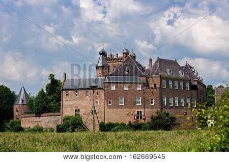 S'HEERENBERG, GELDERLAND/ THE NETHERLANDS - JUNI 4,2016:View of the historical castle Haus Berg in summer