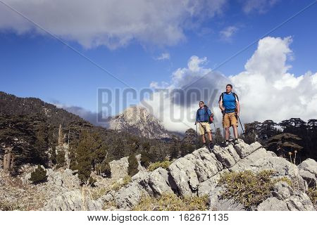Hiking in the mountains in the summer on a sunny day.
