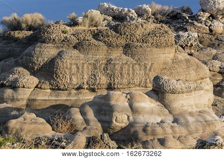 Tufa formations along a lake bed in the desert