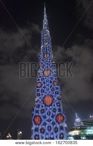 DUBAI, UAE - DEC 9: The LED lights show at Burj Khalifa in Dubai, UAE, as seen on Dec 9, 2016. The show titled Ascension was created by London-based Yusuke Murakami and Tangent Design and Invention.