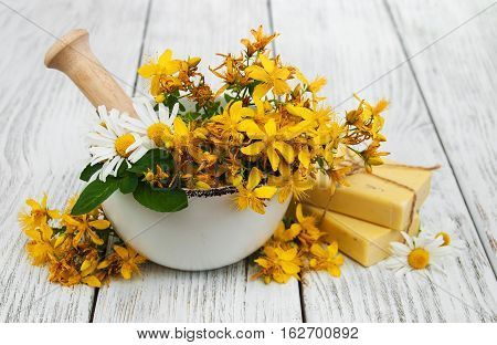 Tutsan Flowers  And Mortar With Soap