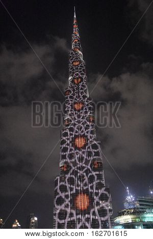 DUBAI, UAE - DEC 9: The LED lights show at Burj Khalifa in Dubai, UAE, as seen on Dec 9, 2016. The show titled Ascension was created by London-based Yusuke Murakami and Tangent Design and Invention.