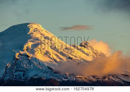 Antisana volcano at sunset, like a gold mountain