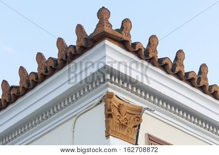 stoneware roof decoration in old building, sky