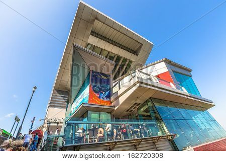 Hong Kong, China - December 10, 2016: perspective view of iconic building Peak Tower, atop Victoria Peak, and its panoramic restaurant. The Peak Tower is the island's highest viewing platform.