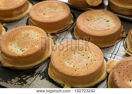 The group of Japanese red bean cake dessert on hole bean cake maker at food street market.