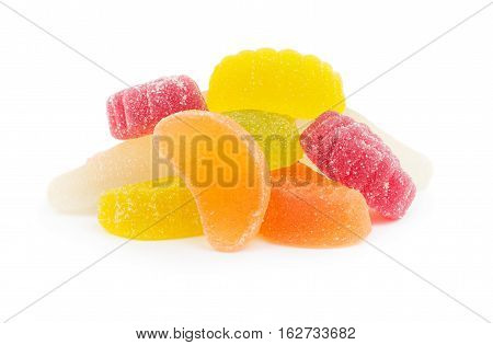 Heap of colorful fruit marmelade candies isolated on white background. Fruit jellies.
