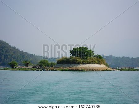 Close up view of small Lalu Island along Sun Moon Lake in Taiwan