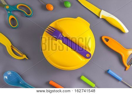 Flat lay set of colour plastic ware