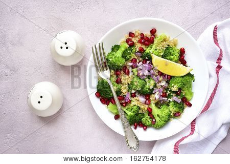 Quinoa Salad With Broccoli,red Onion And Pomegranate.top View.