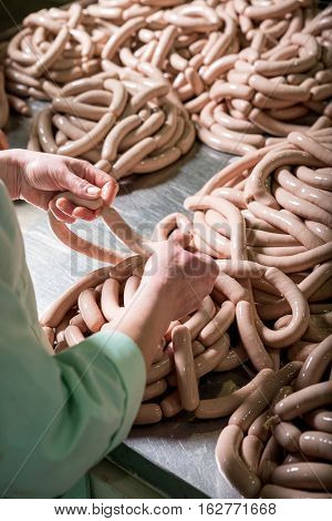 Making sausages, food production in the factory