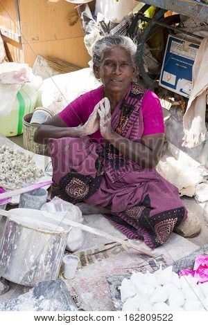 Illustrative image. Pondicherry Tamil Nadu India - July 03 2014. Poor woman worker in small village very hard work for little money roupies