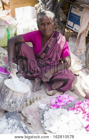 Illustrative image. Pondicherry Tamil Nadu India - July 03 2014. Poor woman worker in small village very hard work for little money roupies