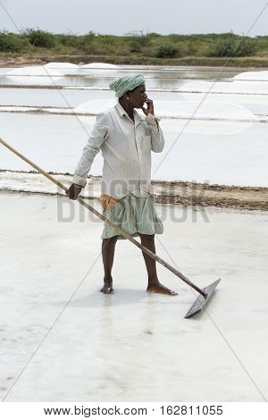 Illustrative image. Pondicherry Tamil Nadu India - July 03 2014. Poor woman worker in small village very hard work for little money roupies