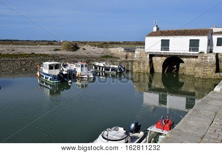 Loix France - september 26 2016 : the picturesque water mill in autumn