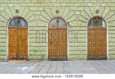 Three entrance - doors in old building