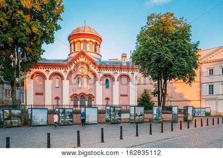 Vilnius, Lithuania - July 8, 2016: Facade Of First Russian Orthodox Church Of St. Paraskeva In Neo-Byzantine Style And Photo Exhibition Near It In Summer Day Under Blue Sky