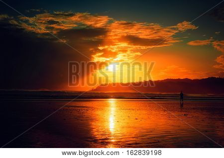 Beautiful sunset on the beach. Time Golden