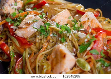 Close Up Of Salmon Pasta And Veggetables