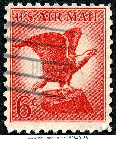 UNITED STATES OF AMERICA - CIRCA 1963: A used US Air Mail postage stamp with an illustration of the iconic Bald Eagle circa 1963.