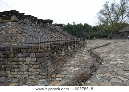 Ruins and drainage canal at the pre-Columbian archeological site El Tajin in Papantla, Veracruz, Mexico