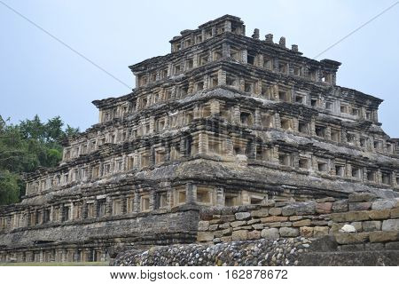 Pyramid of the Niches at the pre-columbian archeological site known as El Tajin located in Papantla, Veracruz, Mexico taken during a thunderstorm