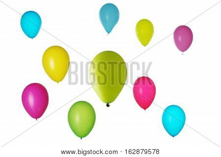 Colorful balloons blured on light background, fun