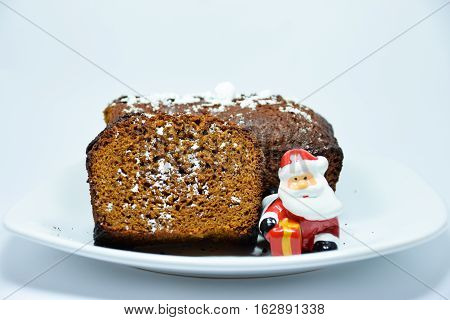 ginger cake made with organic honey. Christmas cake on white background