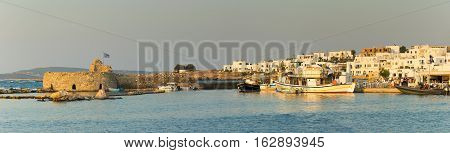 Paros, Greece 5 August 2016. Panoramic view of Naoussa local village with Kastelli castle.