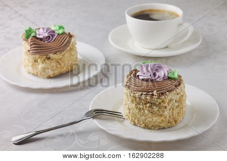 Homemade cake dessert with cream on a white background