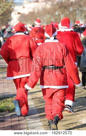 People Run During The Sporting Event Called Running With Santa C