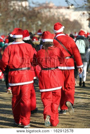 People Run During The Sporting Event Called Running With Santa C