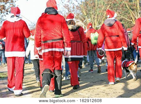 People Run In The Public Park Of The City At Christmas