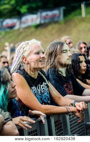TOLMIN, SLOVENIA - JULY 24TH: HEAVY METAL FANS WITH DREADLOCKS HEADBANGING AT THE METALDAYS FESTIVAL ON JULY 24TH, 2016 IN TOLMIN, SLOVENIA