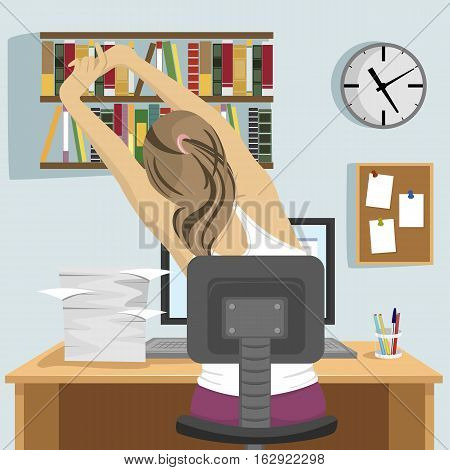 back view of young woman sitting and stretching on workplace in the office or at home