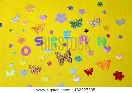 Easter holiday Easter Spring moths stars flowers on a yellow background
Ostern Ostern Frühjahr Motten Sterne Blumen auf einem gelben Hintergrund
