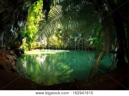 Railay Lagoon -- small lake connected underground to the sea. Hidden between karsts rocks. Krabi Province, Thailand.