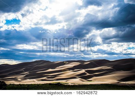 Great Sand Dunes National Park Of Colorado Amazing Clouds With Dynamic High Contrast Sun Rays Beam D
