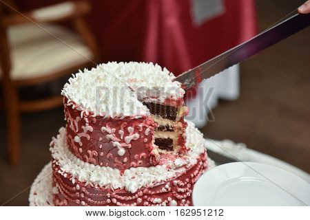 wedding red white cake on a table