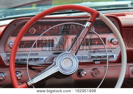 a Dashboard of a vintage sports car