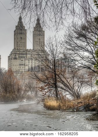 Central Park New York City on foggy morning fter snow storm