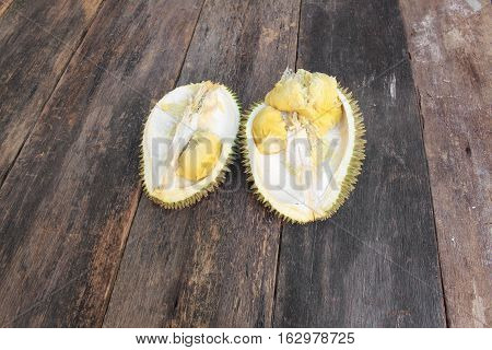 durian peeled ripe close up King of fruit Thailand on the wooden table floor with copy space for add text