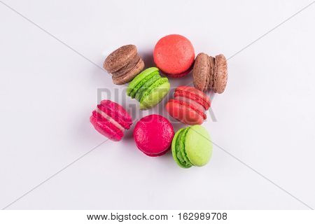 Macaroons for dessert on a white background shot closeup