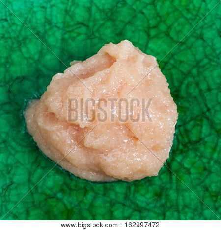Portion Of Salty Caviar Of Cod Fish On Green Plate