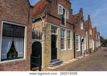 Traditional Dutch Houses In A Street In Monnickendam, Holland