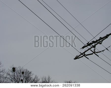 Wires Pole With Blue Sky. Electrical Wires On A Background. Electric Cables. Power Cable With Blue S