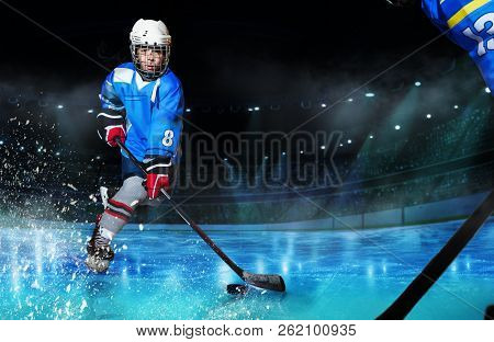 Hockey Player Passing The Puck During Competition