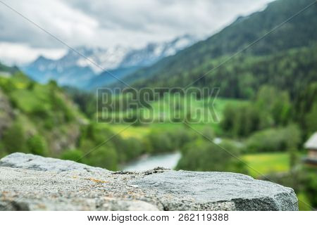 Lavin, Switzerland, May 13, 2018. Beautiful view of Lavin municipality situated on the Inn river bank between mountains.