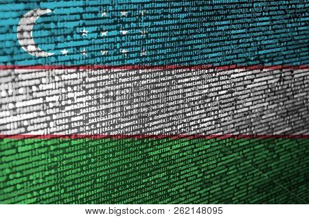Uzbekistan Flag  Is Depicted On The Screen With The Program Code. The Concept Of Modern Technology A