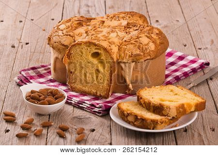 Easter Dove Bread (colomba Pasquale) On Wooden Table.
